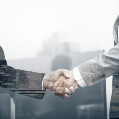 business-partners-handshake-international-business-concept